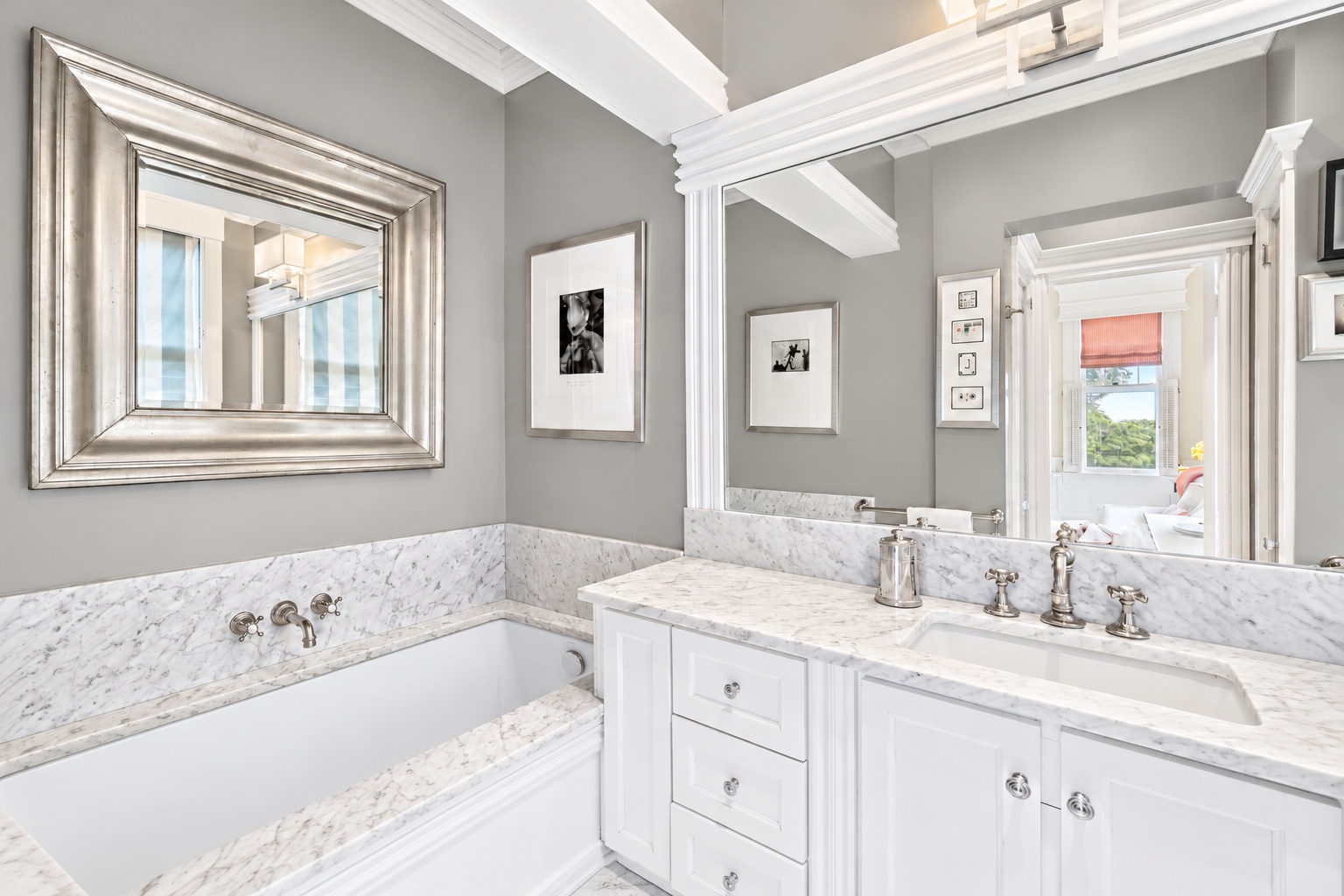Principal bathroom with silver-gray walls, a marble vanity, and bathtub